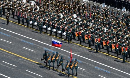 Russian servicemen attend the Victory Day Parade in Red Square in Moscow, Russia, June 24, 2020. The military parade, marking the 75th anniversary of the victory over Nazi Germany in World War Two, was scheduled for May 9 but postponed due to the outbreak of the coronavirus disease (COVID-19). Host photo agency/Evgeny Biyatov via REUTERS